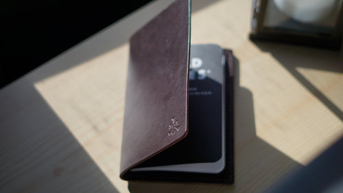 Close-up of Wickett & Craig Dark Brown Cove on a wooden surface