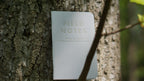 Birch Bark Field Notes in tree