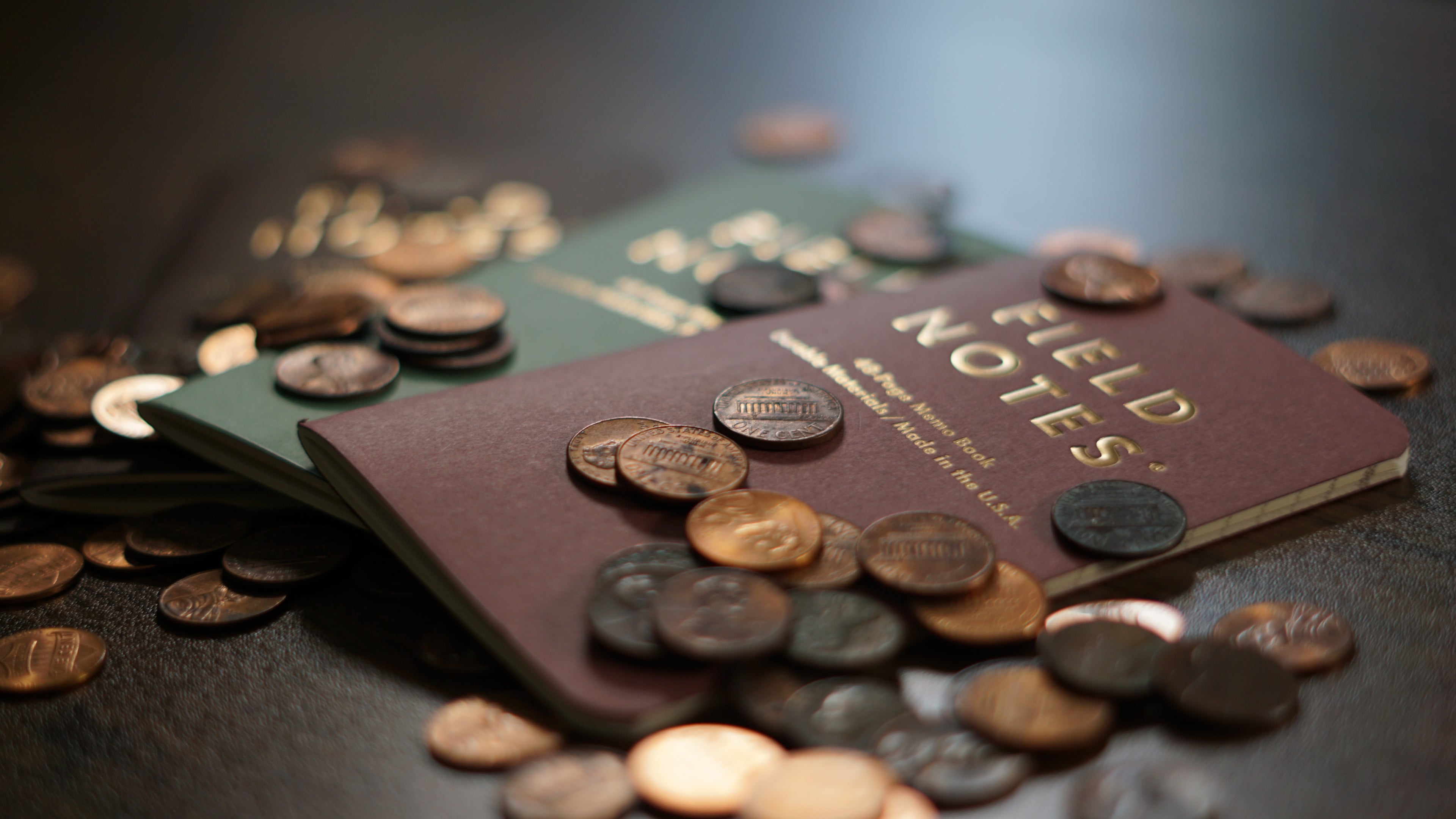 Lucky Field Notes with pennies on them